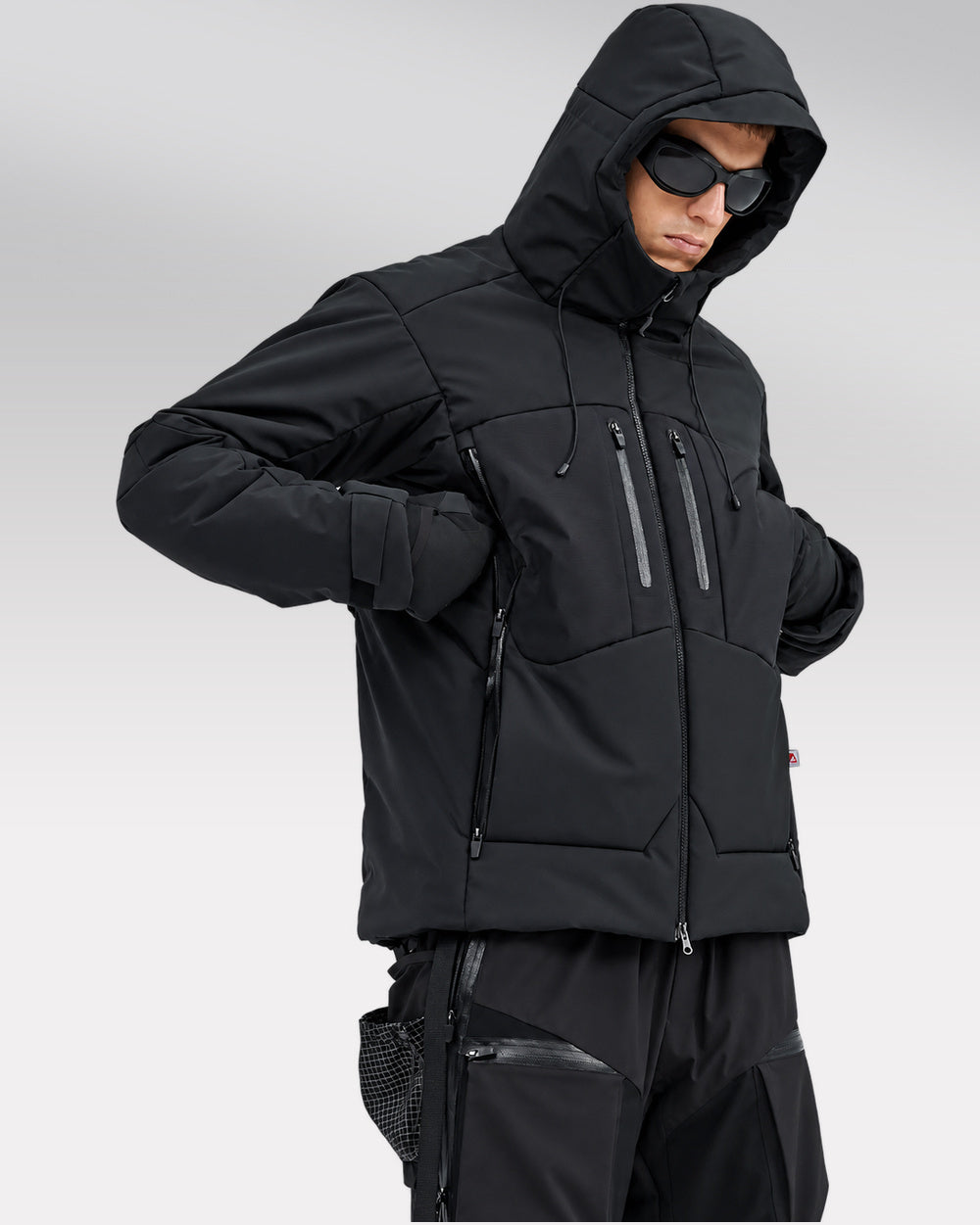 Waterproof Puffer Jacket Hinohe in black - side pocket access