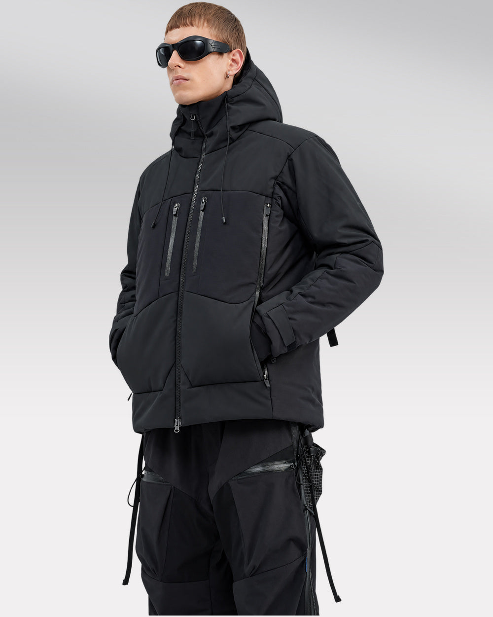 Waterproof Puffer Jacket Hinohe in black - hood-down three-quarter styling