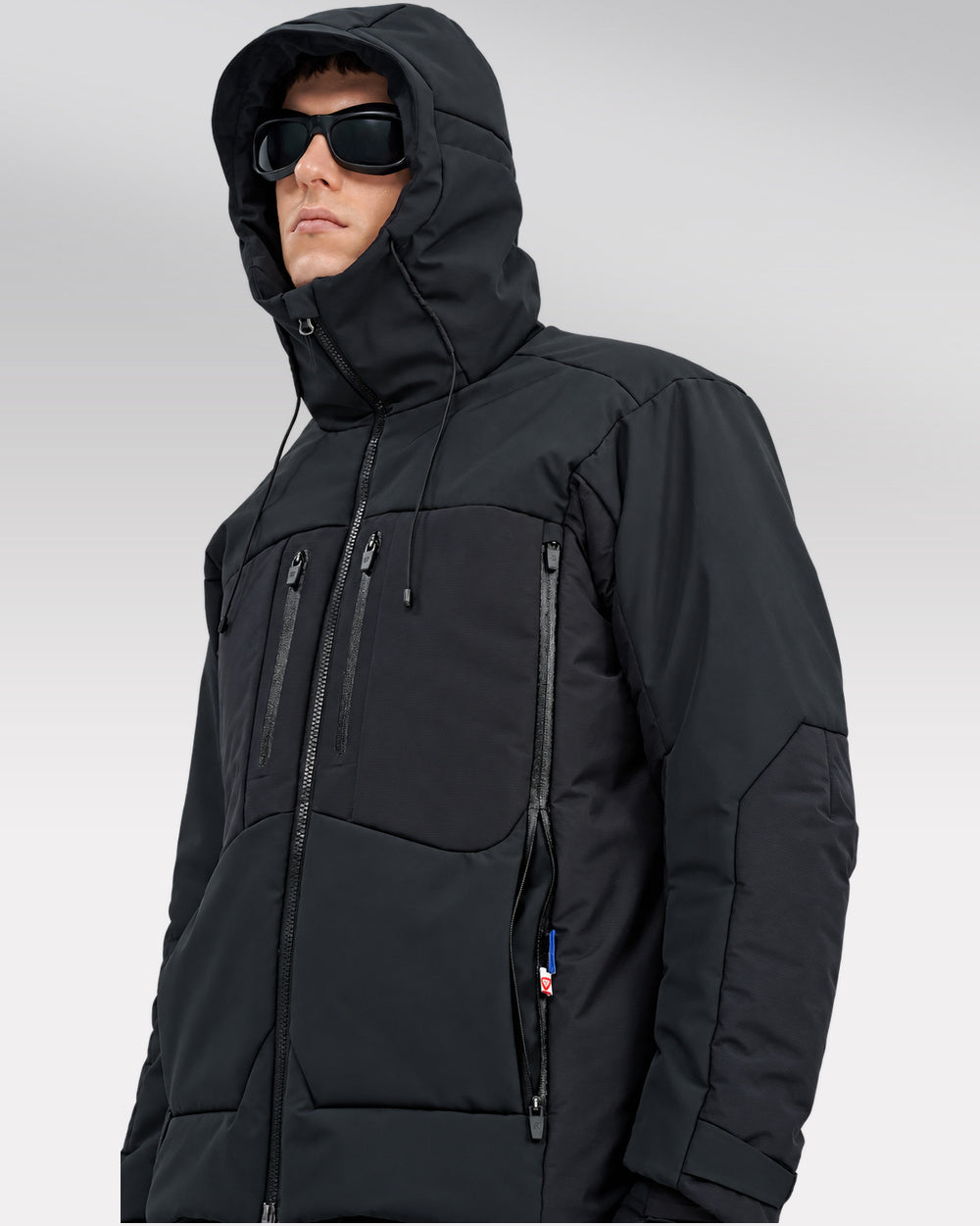 Waterproof Puffer Jacket Hinohe in black - hood-up three-quarter front view