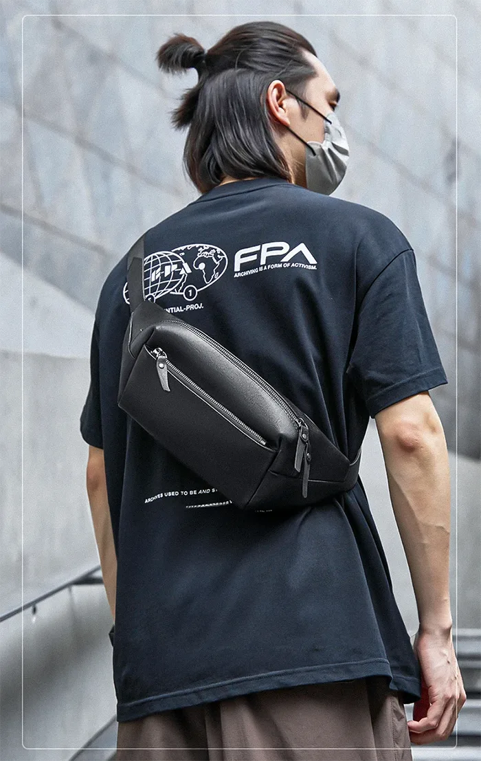 man wearing the Leather fanny pack crossbody "Arao"