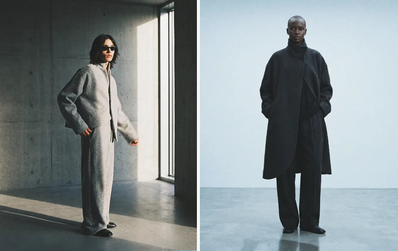Avant-garde clothing looks in neutral tones, including a textured grey wool co-ord set with a cropped bomber jacket and wide-leg trousers — alongside a dark charcoal oversized wool coat over a matching turtleneck and wide-leg pants in a minimalist grey studio