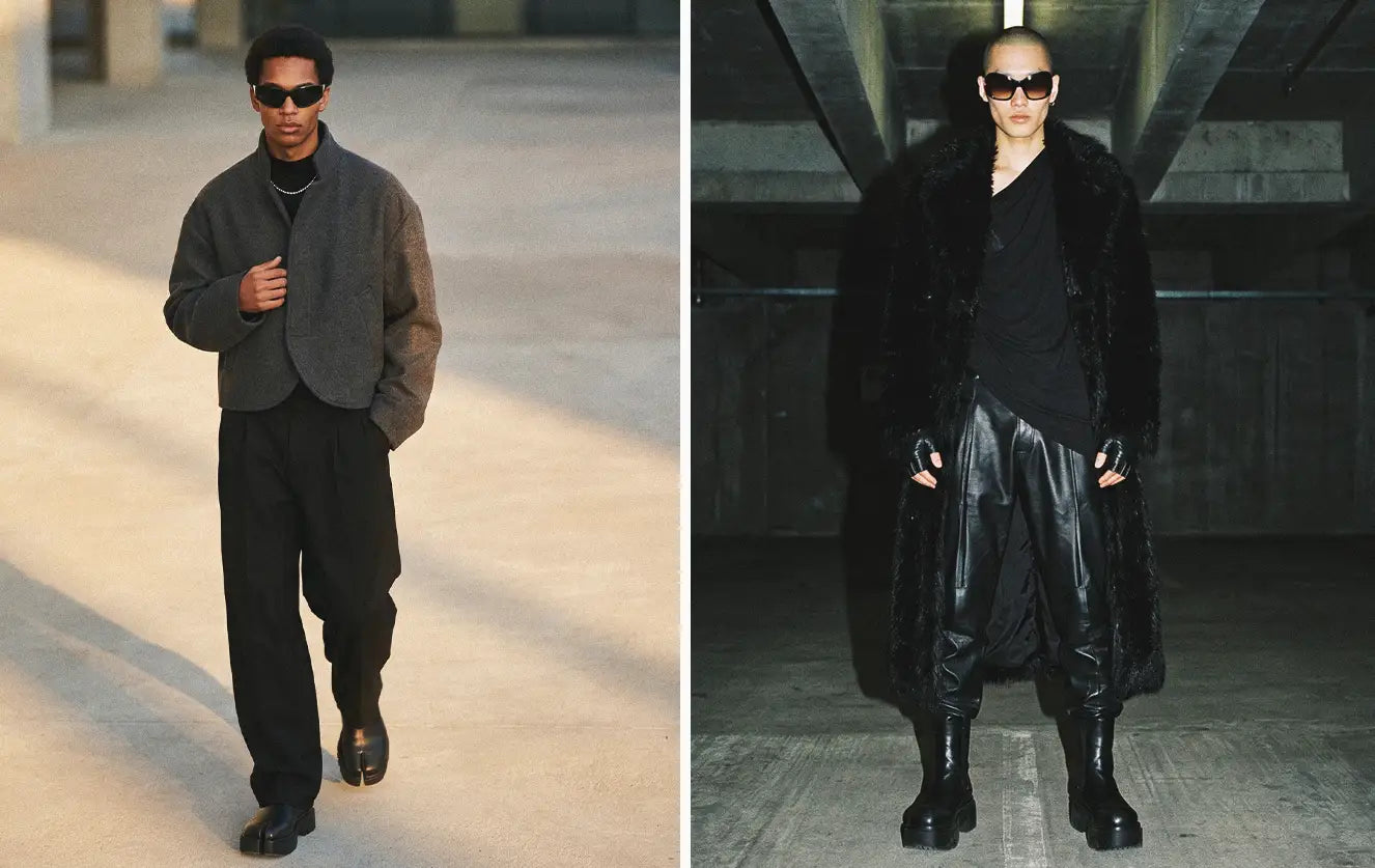 Left: Mixed-race male walking runway in cropped grey wool jacket over black wide-leg pleated trousers with tabi boots. Right: Asian male in industrial concrete space wearing long black faux fur coat over draped black top and black leather drop-crotch pants with platform boots