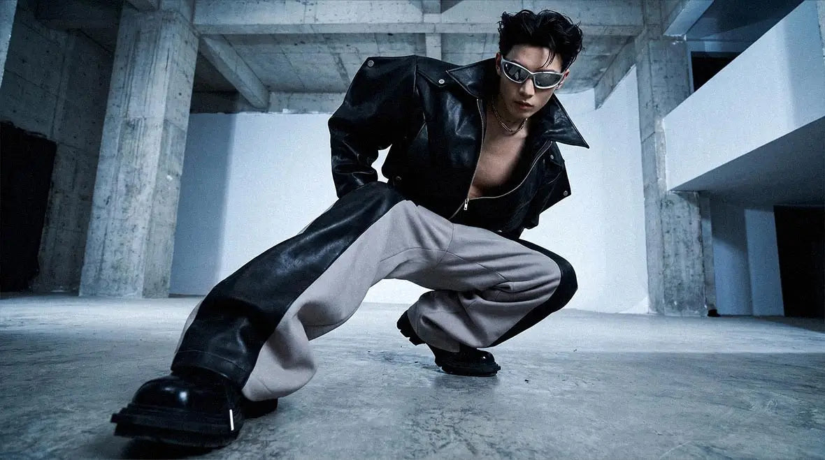 Full monochrome outfit styled with avant garde pants