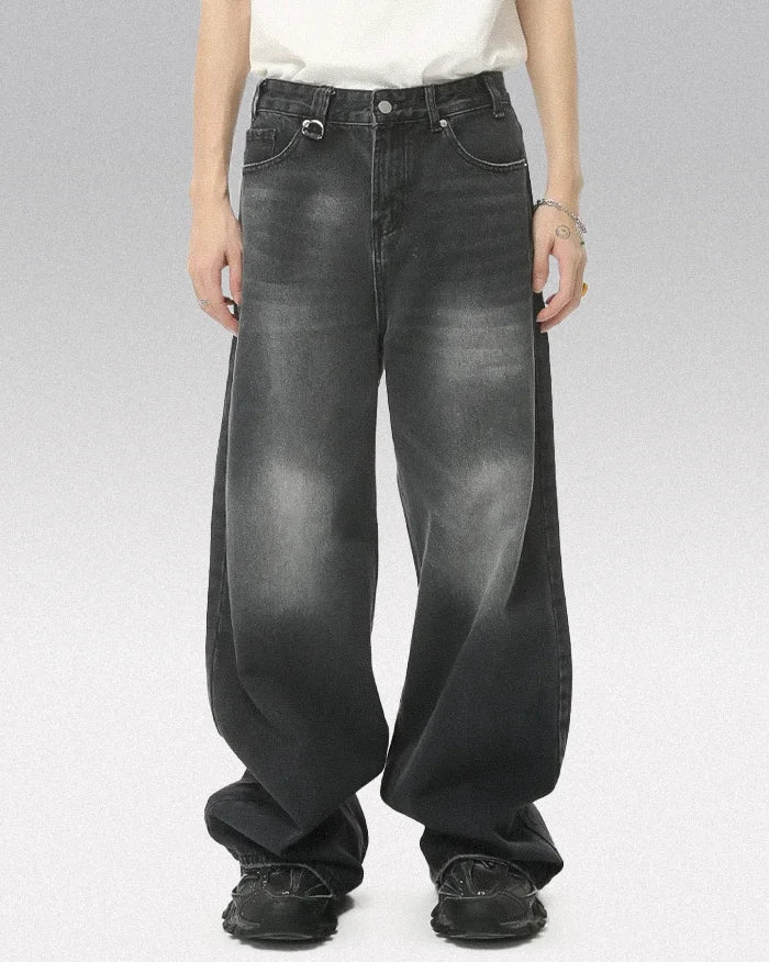 man wearing the Black distressed jeans "Aira"