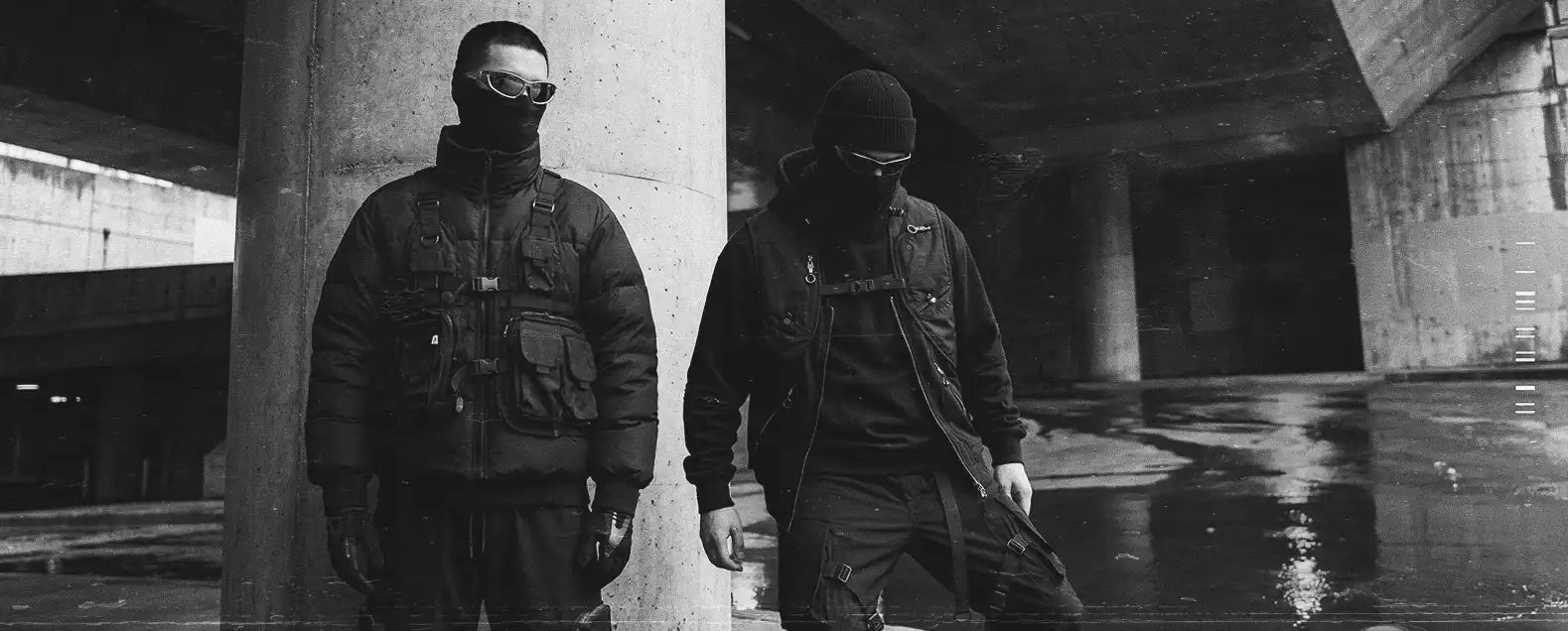 two men in techwear outfits