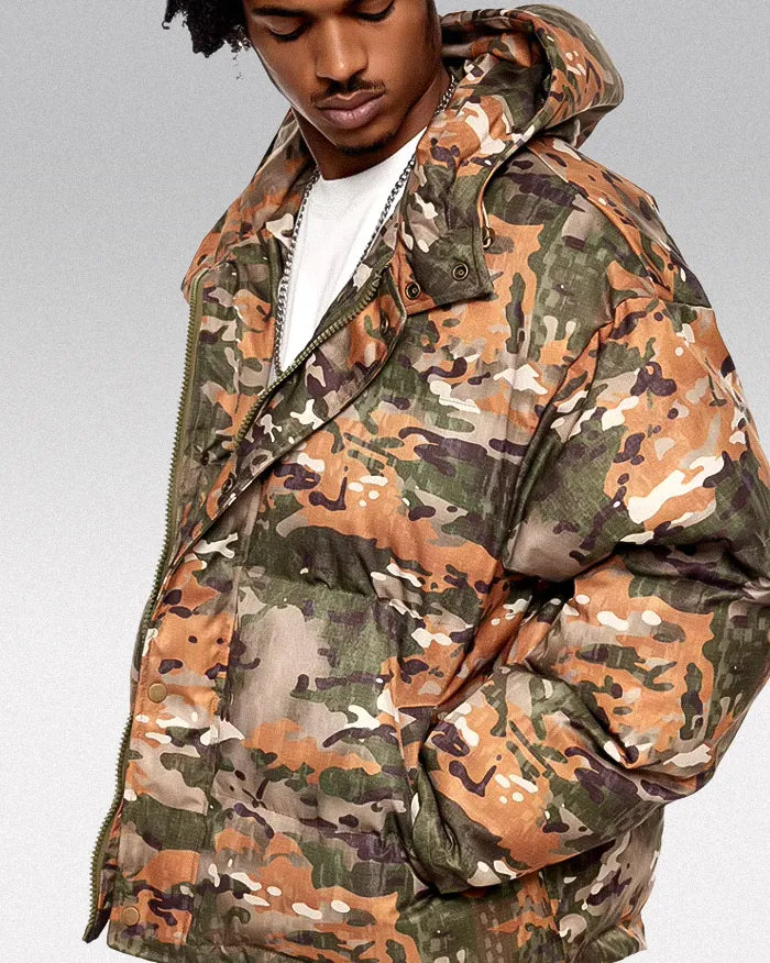 black man wearing the Camo padded jacket "Rugame"