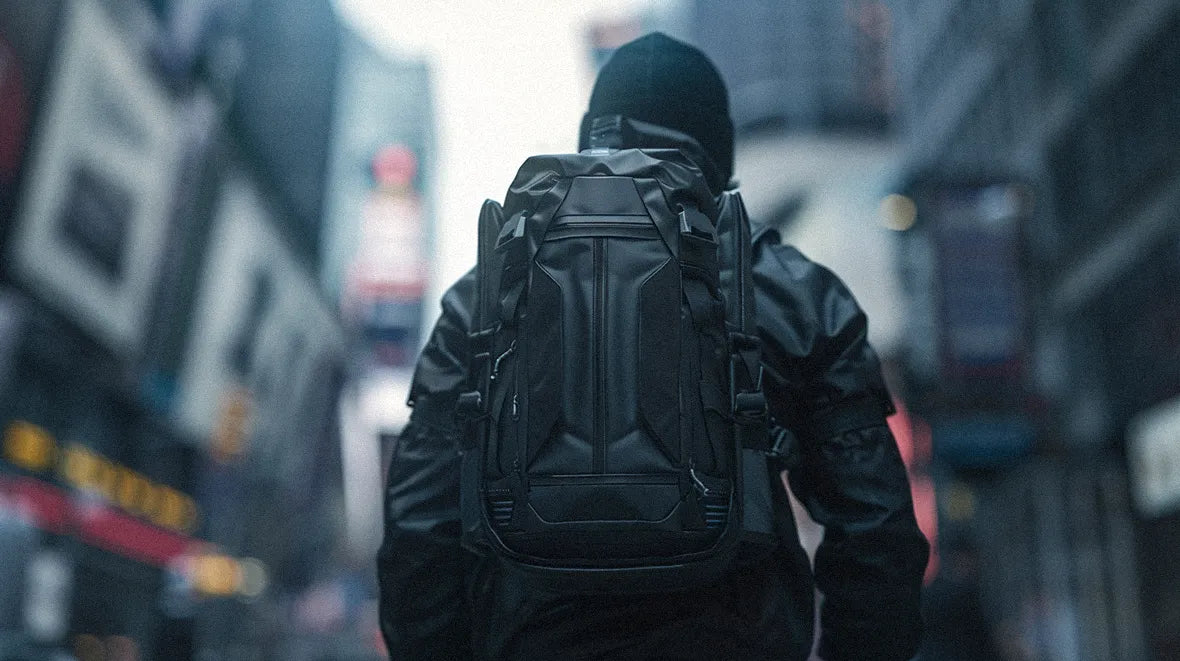 man with techwear backpack