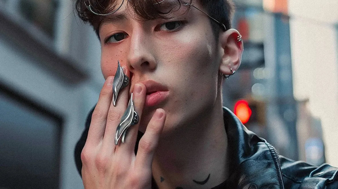 asian man with cyberpunk jewelry