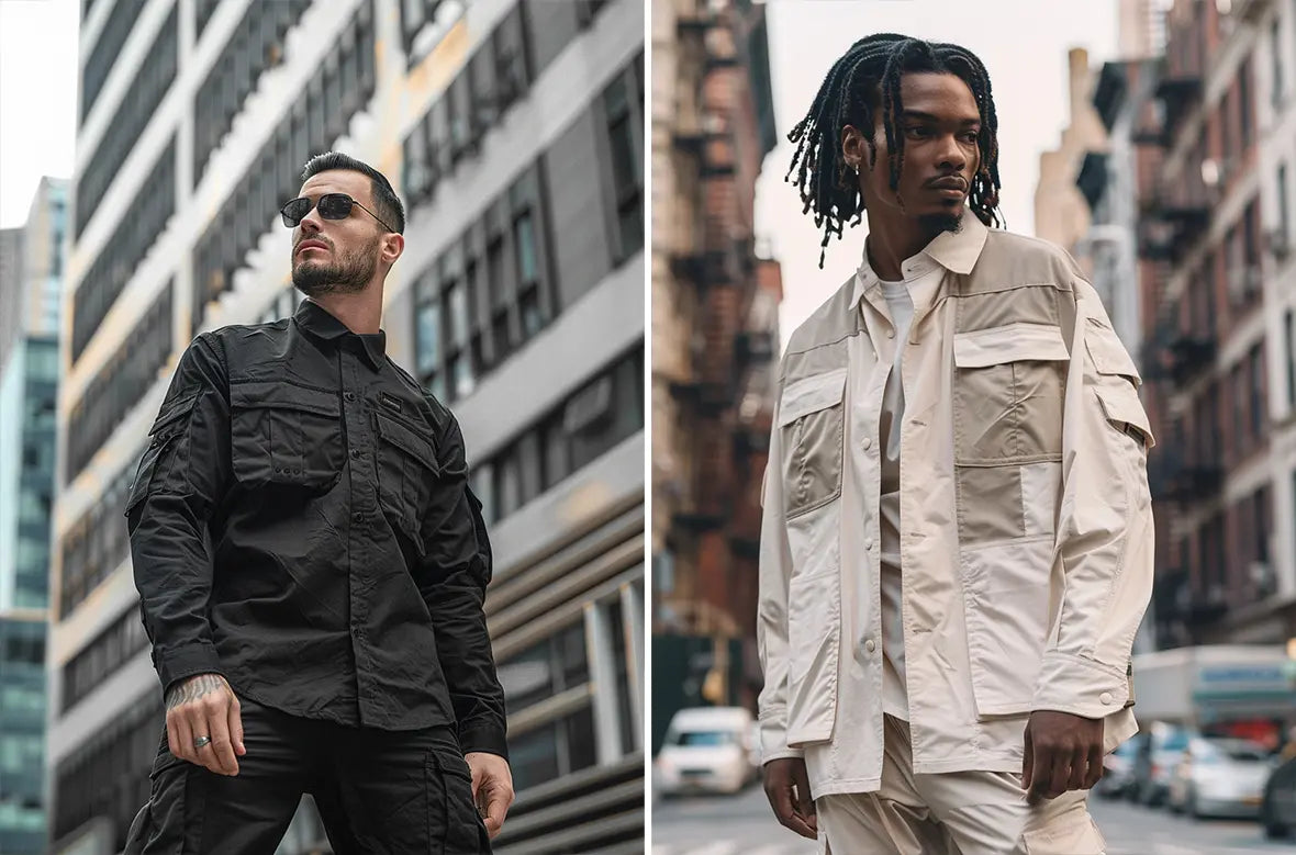  Two men wearing techwear long sleeve shirts; one in an all-black button-up with multiple utility pockets and the other in a beige and white tech jacket