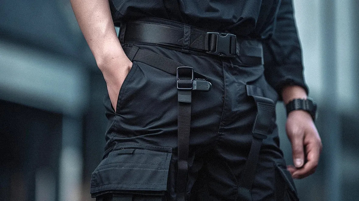 man wearing a black techwear belt