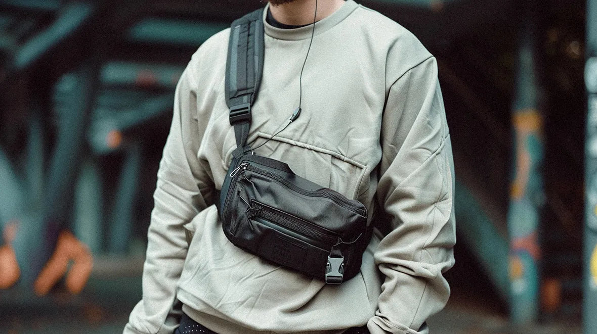 a man wearing a techwear fanny pack