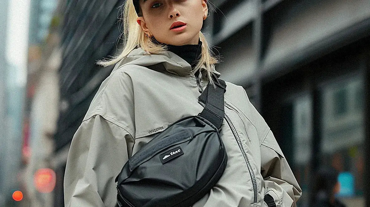 a blonde girl wearing a techwear fanny pack