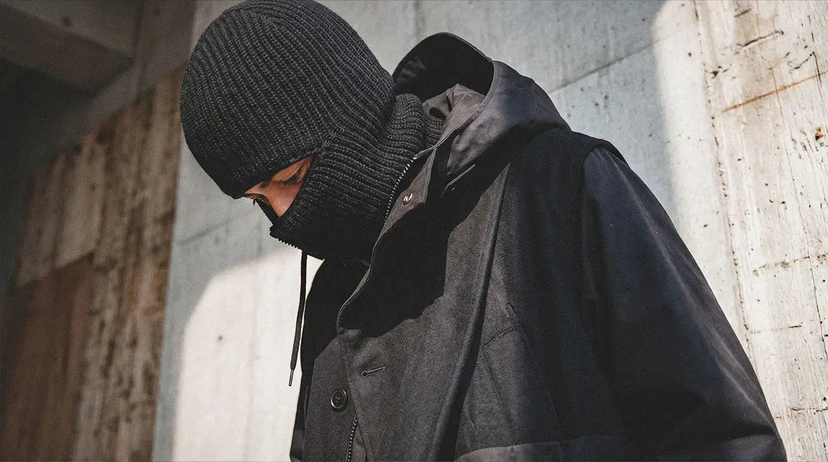 Techwear hat final street style look, dark urban aesthetic