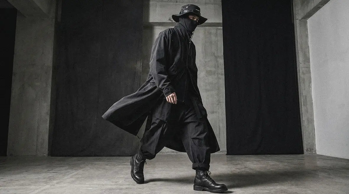 Techwear hat styled in an all-black urban street fit