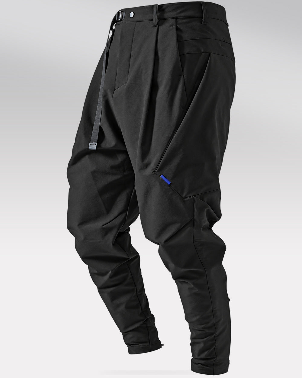 Techwear trousers "Kaoru" in black, isolated three-quarter product view