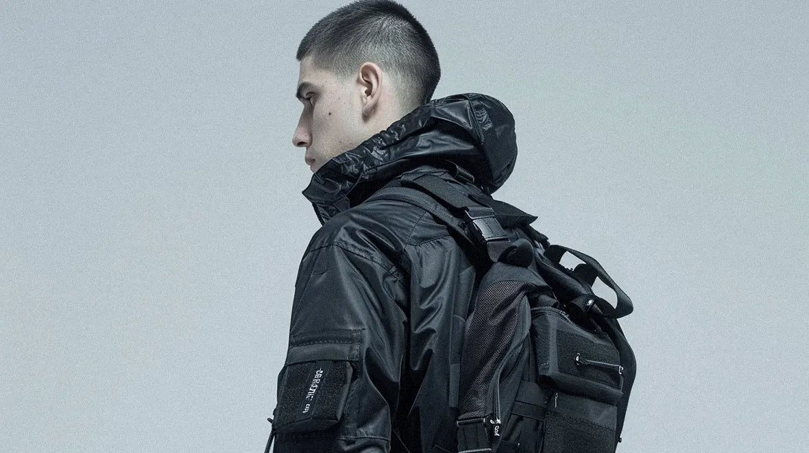 a man wearing a techwear backpack