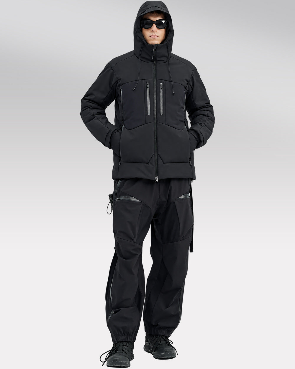 Waterproof Puffer Jacket Hinohe in black - front styling with hands in pockets