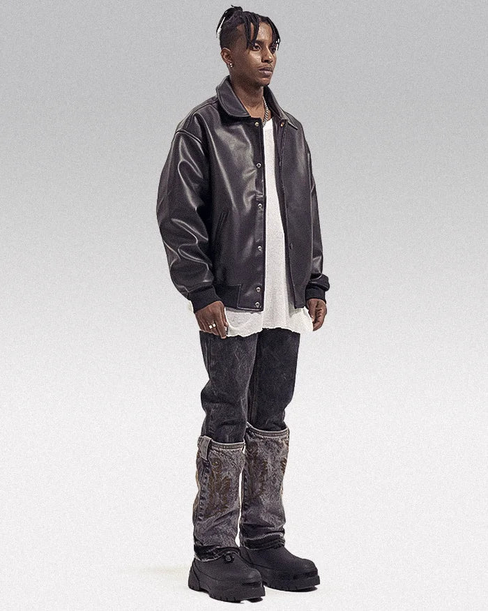 black man wearing the Y2k aesthetic jeans "Hakusan"
